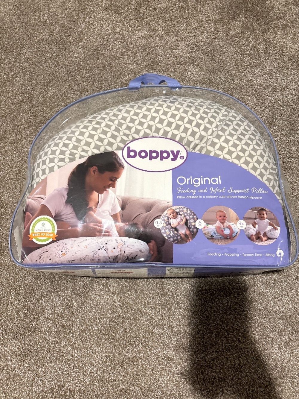Boppy nursing bottle feeding and tummy time baby pillow with extra white cover